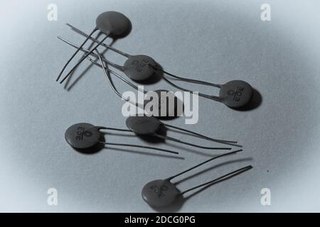 electronic components scattered on clear background Stock Photo