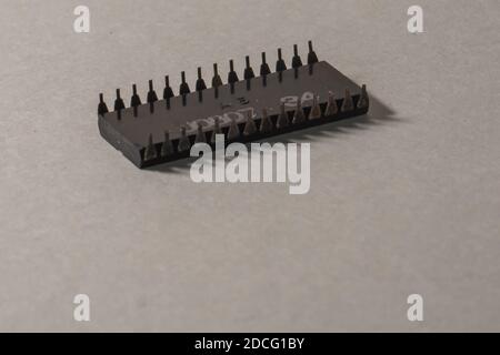 close-up of an isolated microchip on a light background Stock Photo