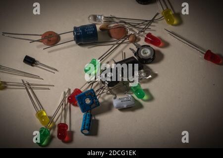 electronic components scattered on clear background Stock Photo