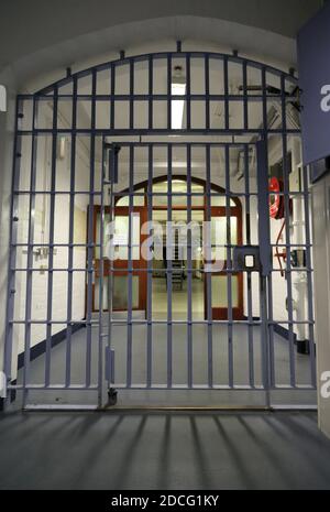 Closed steel gate inside infamous Reading Prison where Oscar Wilde was incarcerated, Reading, Berkshire, UK Stock Photo