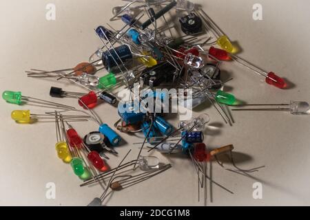 electronic components scattered on clear background Stock Photo