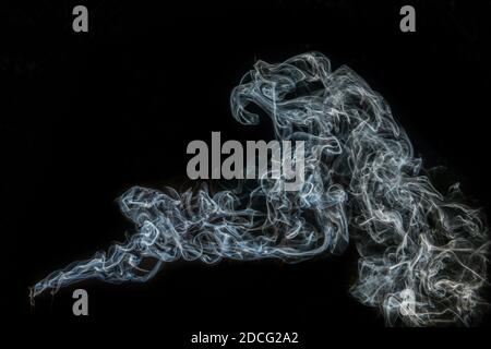 blue Smoke and dust on black background Stock Photo