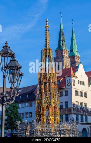 Schoener Brunnen Fountain in the Market Square with St. Sebaldus Church in the background, Nuremberg, Bavaria, Germany, Europe Stock Photo