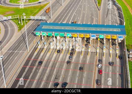 Top view aerial overloaded toll road or tollway on the controlled access highway, forced traffic jam Stock Photo