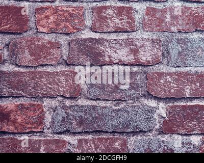 Distressed Overlay Texture of The Rusted Peeled Brick Wall Stock Photo
