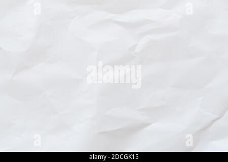 Crumpled white paper texture background, top view Stock Photo