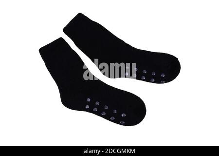 Pair of black woolen socks isolated on white background. Stock Photo