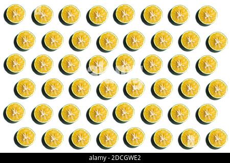 fresh lime slices pattern on white color background. Stock Photo