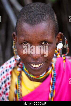 Portrait of a Maasai tribe woman with beaded earrings, Rift Valley Province, Maasai Mara, Kenya Stock Photo