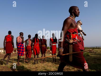 Maasais tribe men in traditional clothing, Kajiado County, Amboseli park, Kenya Stock Photo