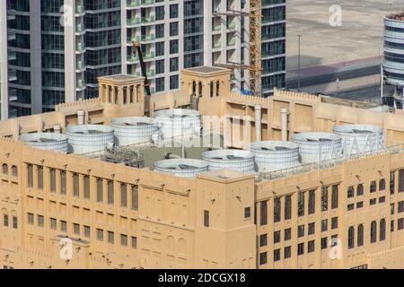 Industrial rooftop fan system for air conditioning HVAC systems of large commerical middle eastern building. Stock Photo