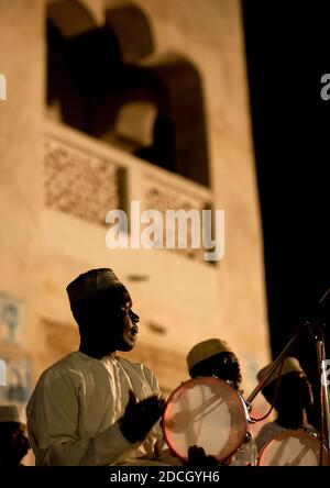 Musicians on stage playing during Maulid festival, Lamu County, Lamu, Kenya Stock Photo