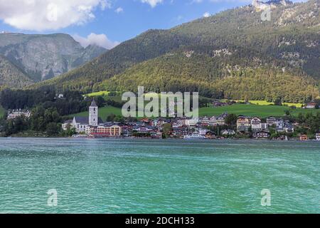 Editorial: ST. WOLFGANG, UPPER AUSTRIA, AUSTRIA, August 16, 2020 - St. Wolfgang in the late afternoon sun with Lake Wolfgang, seen from the middle of Stock Photo