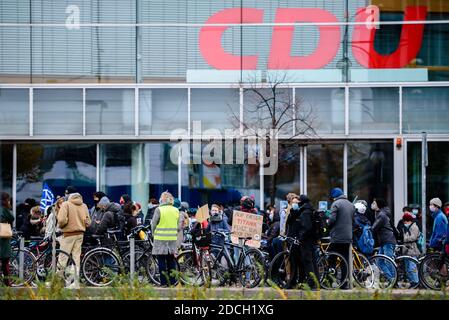 Berlin, Germany. 21st Nov, 2020. Germany, Berlin, November 21, 2020: Activists can be seen in front of Konrad-Adenauer-Haus, the federal office of the CDU, during a bicycle ride for a climate-friendly traffic policy change and against the clearing of the Dannenroeder Forest in Hesse (German: Hessen). Environmental groups demand an immediate stop of the construction of the planned A49 freeway as well as the ongoing police operation of the evictions of activists in the course of the deforestation of Dannenroeder Forest. (Photo by Jan Scheunert/Sipa USA) Credit: Sipa USA/Alamy Live News Stock Photo