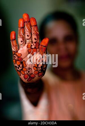 Unrecognizable person shows hand palm painted with henna, Lamu County, Lamu, Kenya Stock Photo