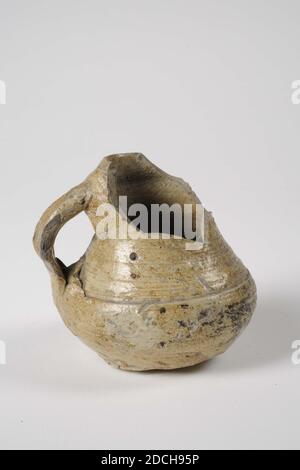 jug, Anonymous, 15th century, stoneware, salt glaze, General: 9 x 9.6 x 9cm 90 x 96 x 90mm, Stoneware jug with brown-gray salt glaze. The jug has a narrow neck that flows into the neck area without separation. The neck is covered with fine rotating rings. The neck changes with a wide groove to a wide, low belly. Part of the neck is missing, 1890 Stock Photo