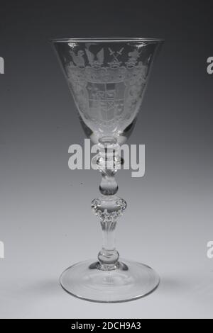 chalice, mid 18th century, General: 19.3 x 8.5cm 193 x 85mm, Base diameter: 8.2cm / Diameter chalice: 8.5cm, family crest, Colorless glass chalice. The chalice has an ascending base and a stem with a foot ring, baluster-shaped button with nine double air bubbles. Above a button and collar, in which a bubble ends in a point. An image of a coat of arms of the genus Gronsfeld Diepenbroeck, surrounded by tarpaulins, has been drilled on the chalice wall. The coat of arms can be described in colors, given the hatchings. Quartered, top left and bottom right in gold, with three red balls, top right Stock Photo