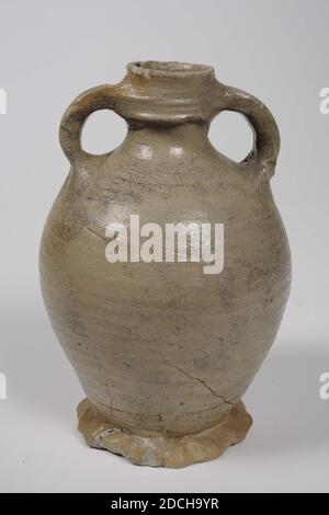 jug, Anonymous, 15th century, stoneware, salt glaze, General: 12.7 x 8.5 x 8.1cm 127 x 85 x 81mm, Small gray stoneware jug, covered with salt glaze. The jug has a spherical body with pinched foot ring and a short, narrow neck with two ears, one of which is broken off. The whole body is covered with rotating rings, 1950 Stock Photo
