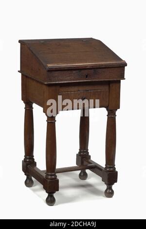 lectern, Anonymous, 17th century, metal, oak, Oak lectern on a base with a protruding sloping flap and a new ledge. The lid of the lectern is hinged to the top frame. The desk contains two side-by-side oval bent metal lock plates with protrusions. The base stands on Doric columnar and twisted articulation and houses with a double T-shaped connection in between. The base is on ball legs. Along the top edge of the chassis run sawn-out S-shaped volutes and consoles at the bottom. The key is missing, General: 124 x 78 x 63cm 1240 x 780 x 630mm Stock Photo