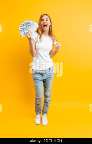 Portrait of customer in white shirt and blue suspenders in tailors boutique  stock photo