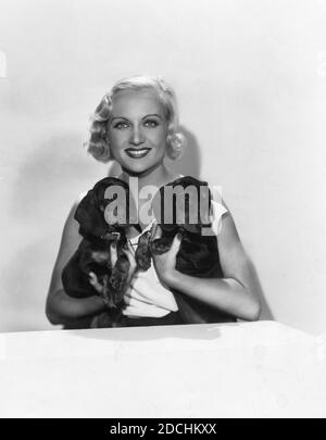 CAROLE LOMBARD 1933 Portrait with Two Dogs publicity for Paramount Pictures Stock Photo