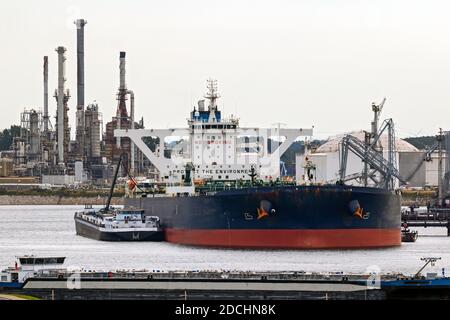 Oil tankers moored near a petrochemical plant in the Port of Rotterdam. Rotterdam. Stock Photo