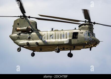 Royal Air Force CH-47 Chinook cargo helicopter in flight over RAF Fairford airbase. UK - July 13, 2018