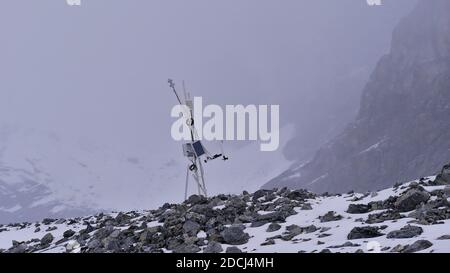 Scientific measurement and weather station on glacier 'Suldenferner', also used to monitor glacial melting due to climate change, in Ortler massif. Stock Photo