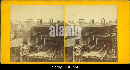 View of a house under construction, showing men finishing the chimney and building a brick wall., still image, Stereographs, 1850 - 1930 Stock Photo