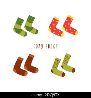 Set warm cozy socks. Comfortable clothes for cold weather. Winter or autumn socks. Isolated vector illustration in flat style Stock Vector