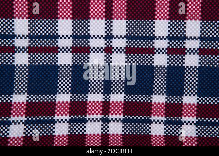 The texture of the checkered fabric - top view and a close-up of a piece of checkered tablecloth Stock Photo