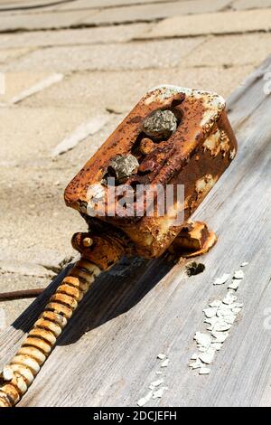 Rusted vintage electrical switch on an abandoned industrial building. Stock Photo