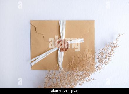 Craft envelope with business card mock up Stock Photo