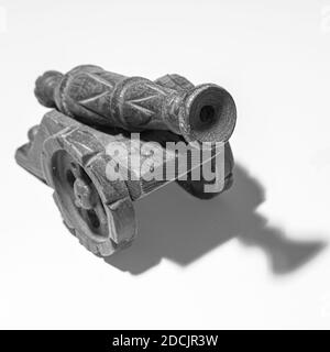 Handmade wooden Cannon in small scale used for decorating Stock Photo