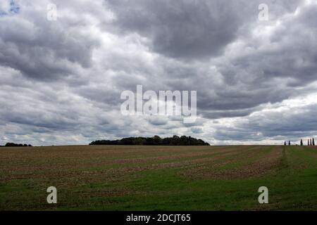 Dark skies over fields in Hertfordshire near Sawbridgeworth, England Stock Photo