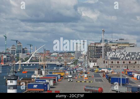 Dublin, Ireland - June 6, 2017: View of Dublin and Samuel Beckett Bridge known as a Harp Bridge from the port of Dublin in Ireland. Stock Photo