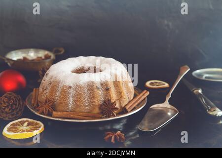 Christmas cake on wooden background with decoration Stock Photo