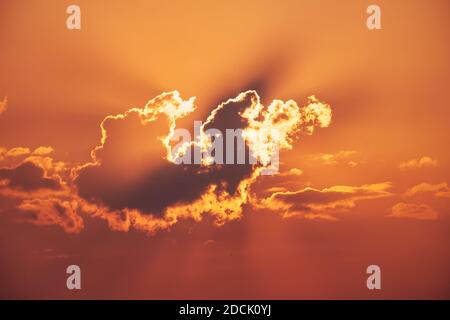 Sunlit red sky and cloud. Natural background from clouds Stock Photo