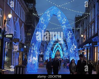 View looking up at the beautiful Christmas lights in South Molton Street in Mayfair London 2020 Stock Photo