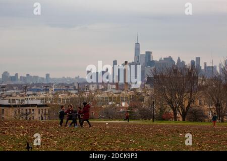 New York, USA. 21st Nov, 2020. Children play at Sunset Park in the Brooklyn borough of New York, the United States, on Nov. 21, 2020. The total number of COVID-19 cases in the United States topped 12 million on Saturday, according to the Center for Systems Science and Engineering (CSSE) at Johns Hopkins University. Credit: Michael Nagle/Xinhua/Alamy Live News Stock Photo