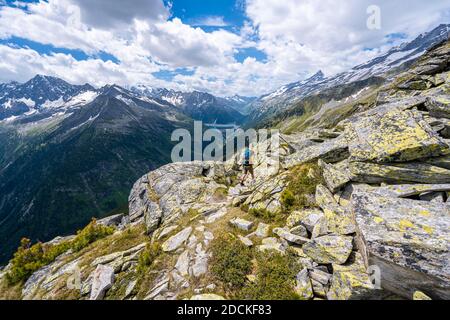 Hiking on the Berlin High Altitude Trail, Schlegeis Reservoir, Schlegeis reservoir, Zillertal Alps, Schlegeiskees Glacier, Zillertal, Tyrol, Austria Stock Photo