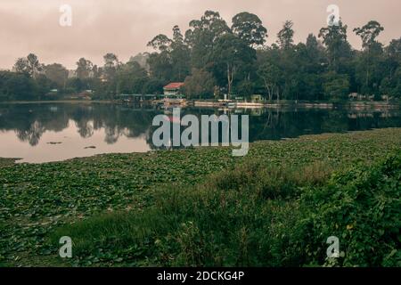 Scenic view of a boat house in Yercaud Lake which is one of the largest lakes in Tamil Nadu. India Stock Photo