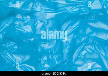 Close up Texture of a Blue Plastic garbage Bag. Polyethylene Film Stock Photo