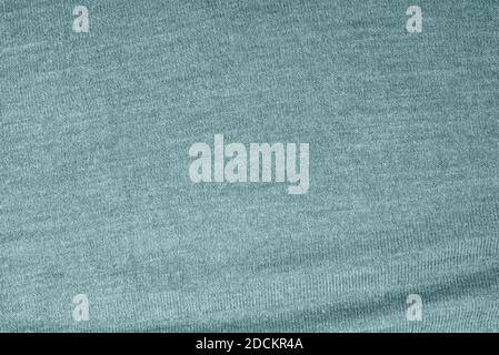 Close up of green knitted textured background. Trendy color. Stock Photo