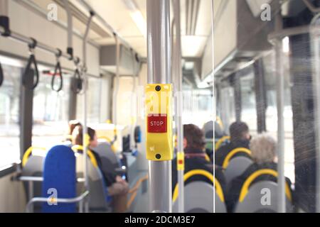 red stop button on public transport tram Stock Photo