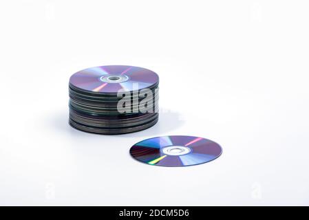 CD and stack of Compact Discs isolated on a white background Stock Photo