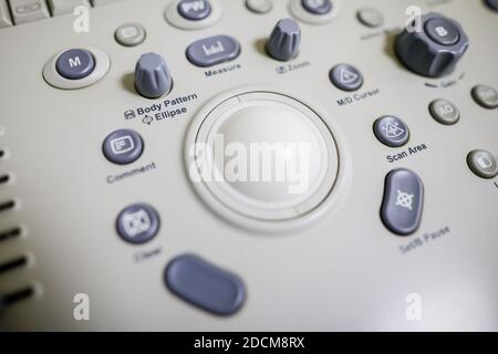 Bucharest, Romania - November 22, 2020: Shallow depth of field (selective focus) image with details of the control panel of an ultrasound machine. Stock Photo