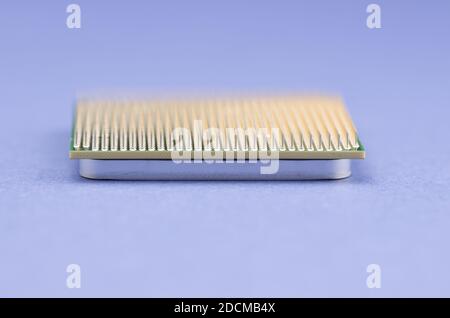 A closeup shot of microprocessor isolated on blue background Stock Photo
