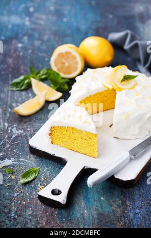 Lemon almond gluten free cake with cream cheese frosting, selective focus Stock Photo