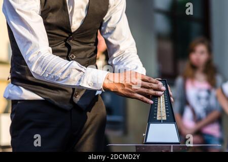 Lublin, Poland - July 27, 2014: Ikeda Yosuke with metronome at new circus and busking festival Carnaval Sztukmistrzow Stock Photo